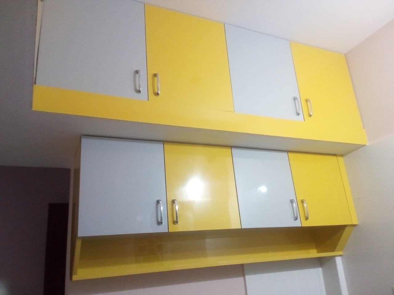 Two-tier overhead storage units in gloss yellow and grey